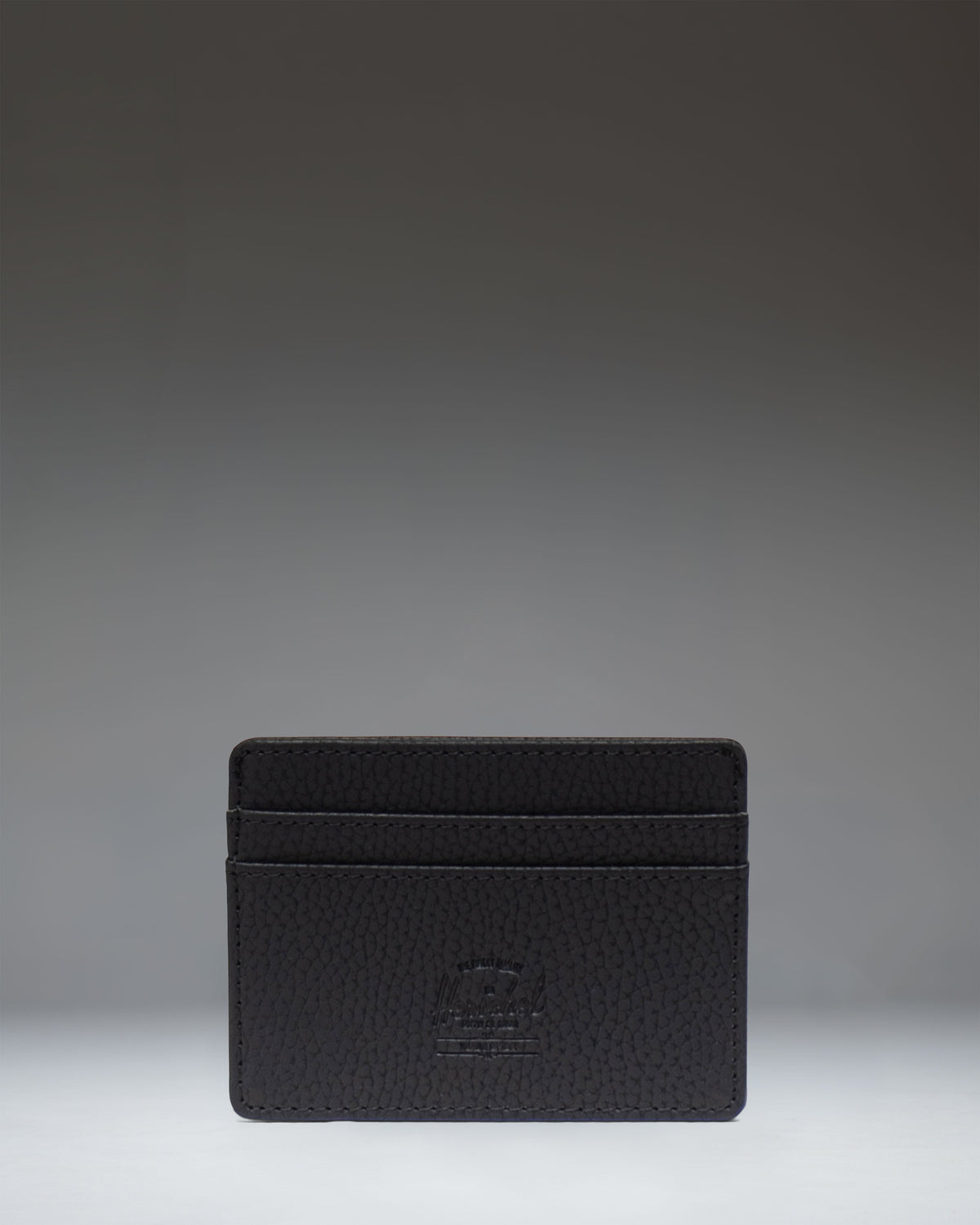 Herschel Charlie Cardholder Vegan Leather Wallet in Black — front view # color_Black