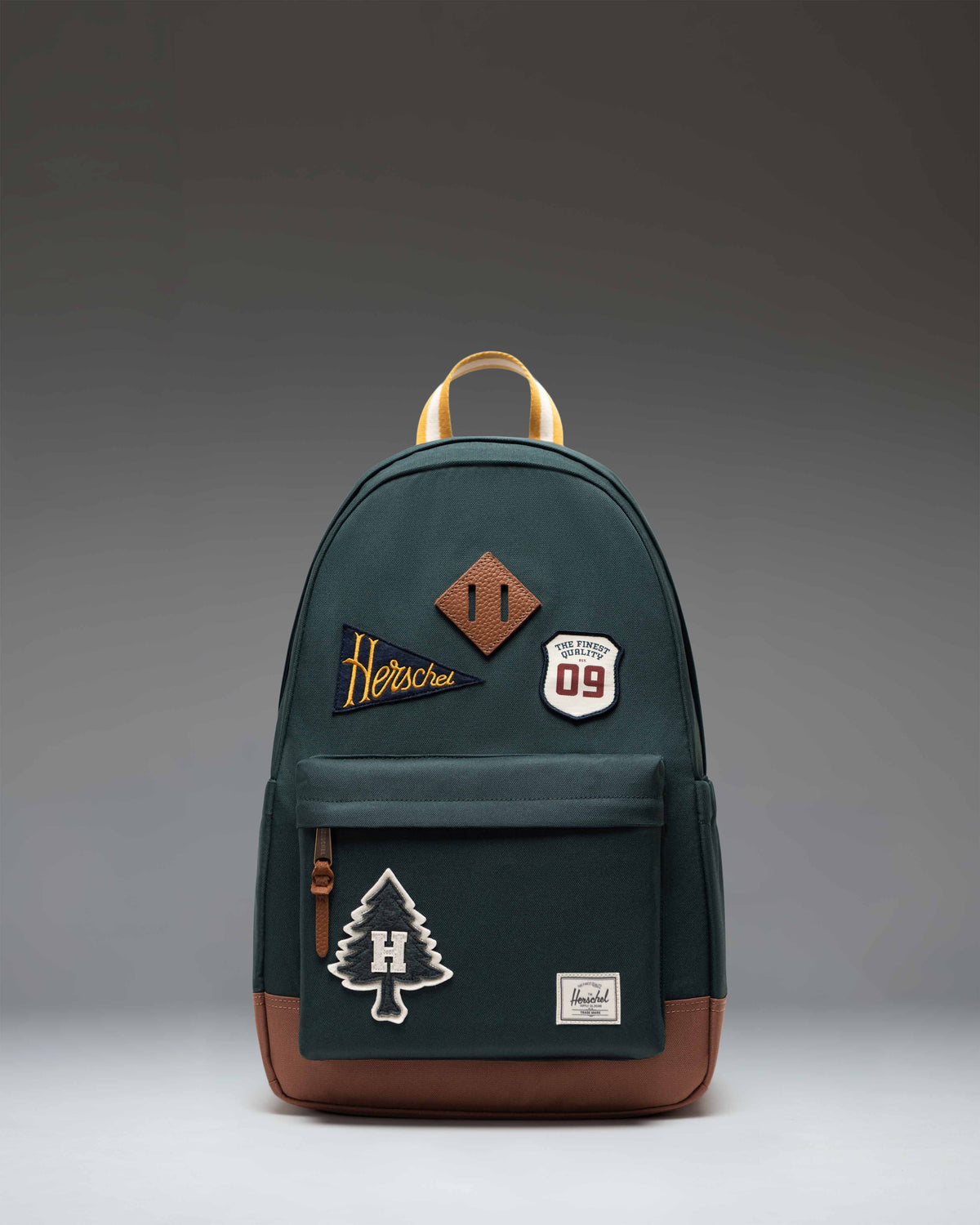 Herschel Heritage Backpack 24L in Patches Green Gables — front view # color_Patches Green Gables