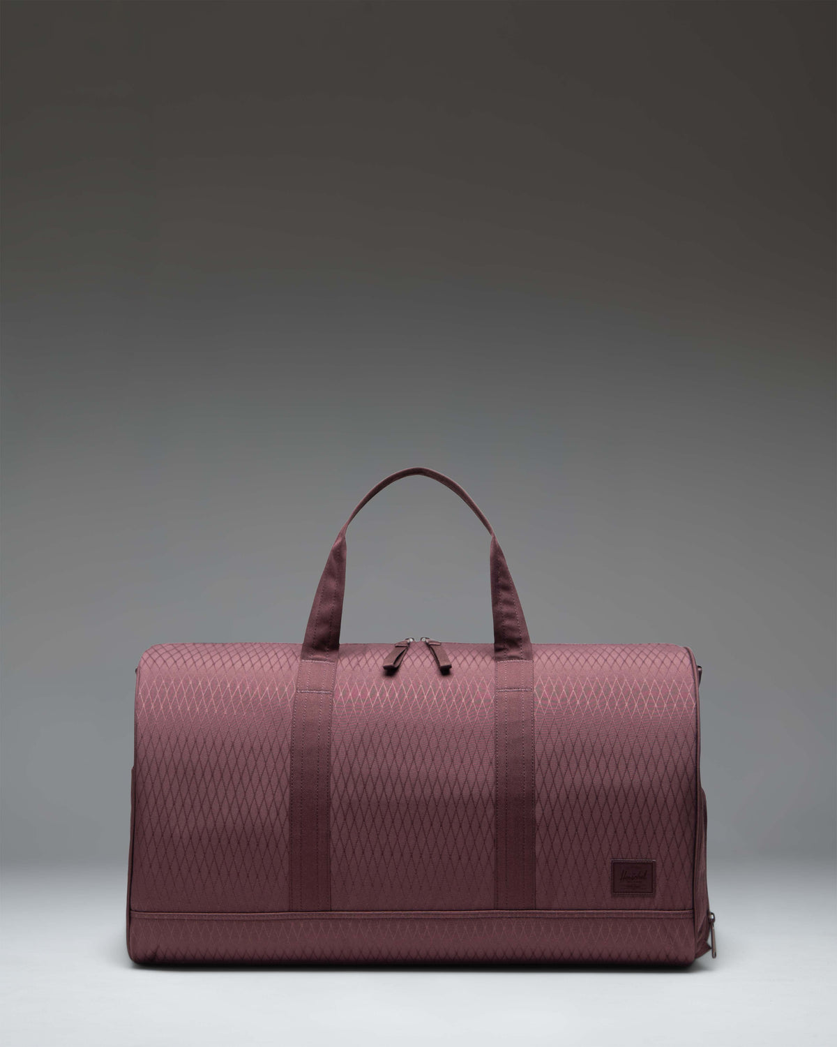 Herschel Novel Duffle 43L in Huckleberry Diamond — front view # color_Huckleberry Diamond