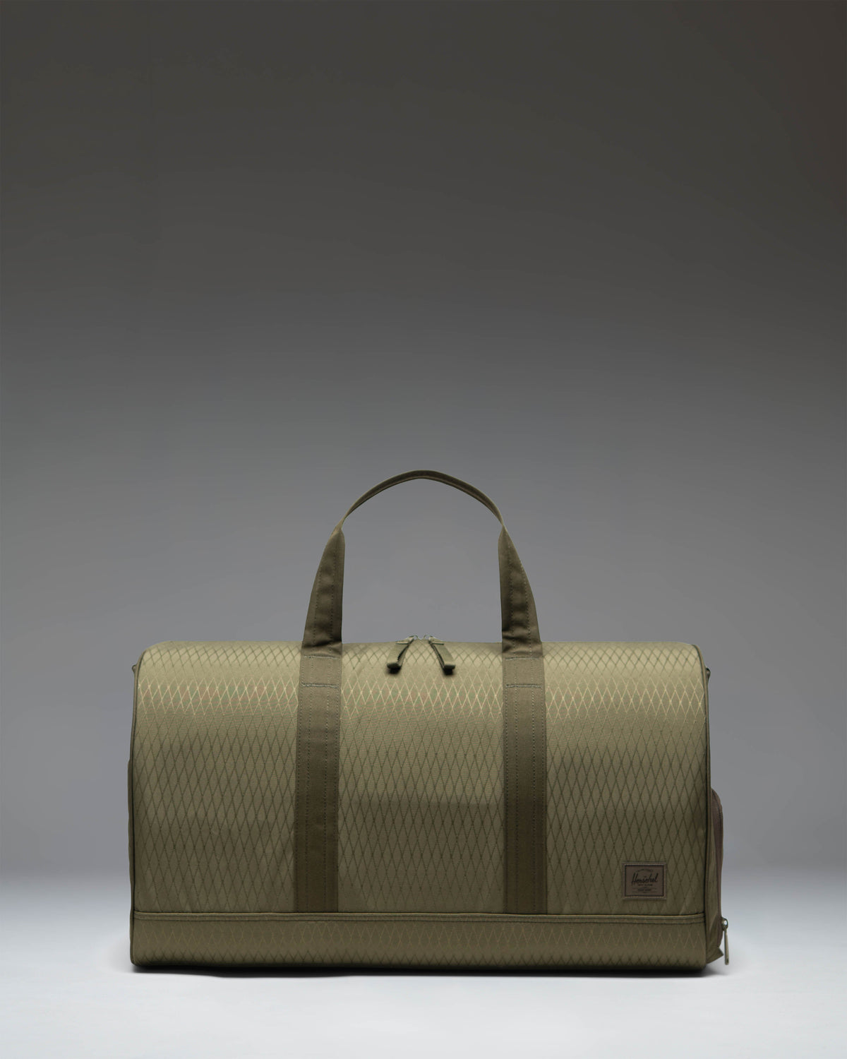 Herschel Novel Duffle 43L in Ivy Green Diamond — front view # color_Ivy Green Diamond