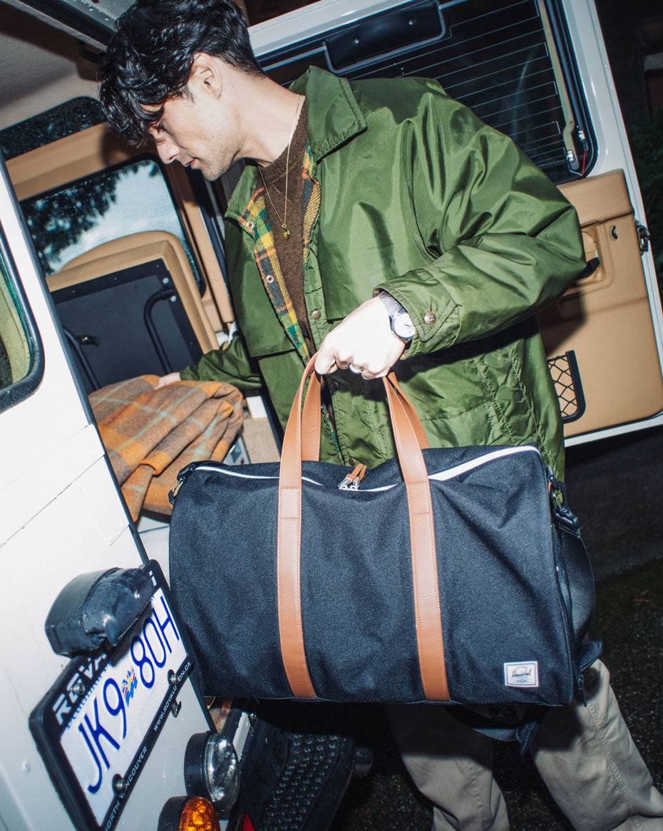 Herschel Novel Duffle 43L in Navy — lifestyle