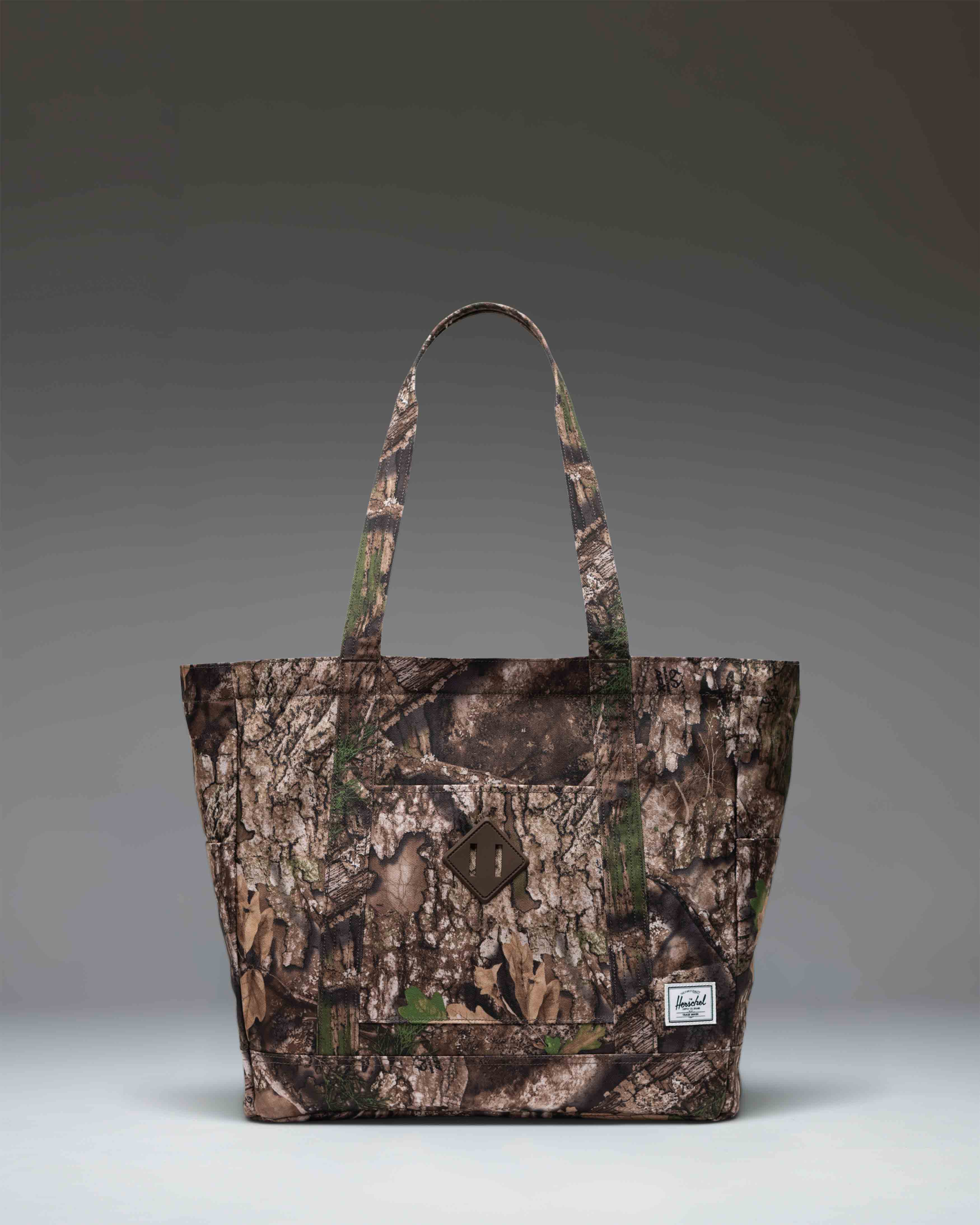 Realtree Herschel Heritage Tote 24.5L in Realtree APX™ Camo — front view