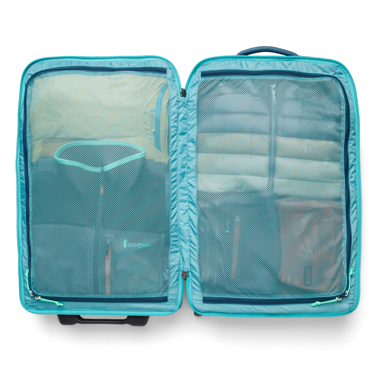 Cotopaxi Allpa 65L Roller Bag in Blue Spruce — angle view 3