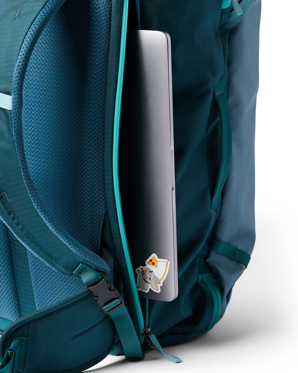 Cotopaxi Allpa 35L Travel Pack in Blue Spruce/Abyss — angle view 1