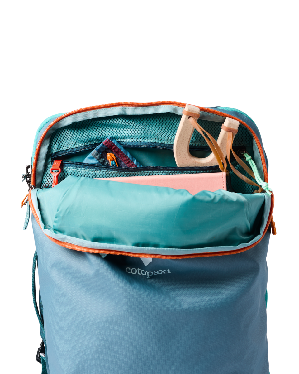 Cotopaxi Allpa 35L Travel Pack in Blue Spruce/Abyss — angle view 4