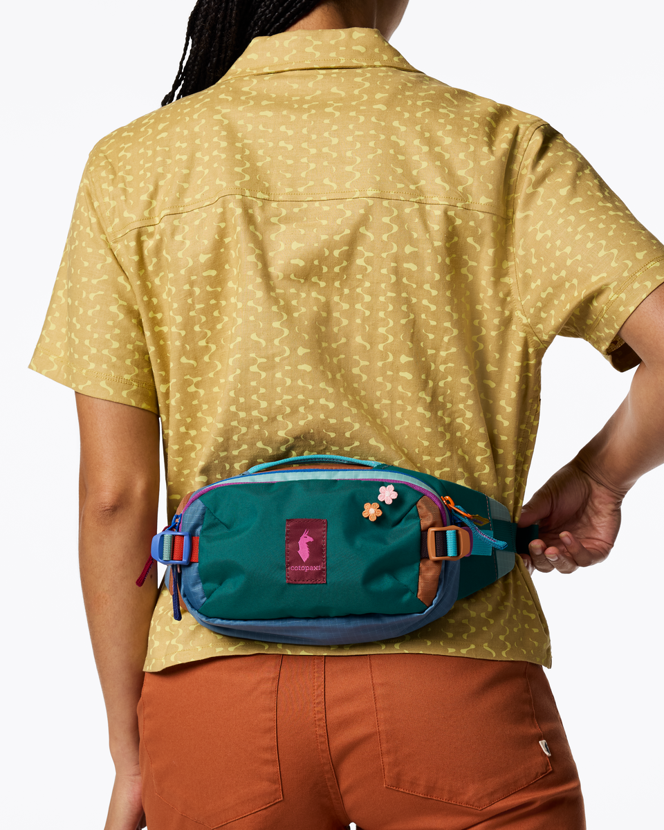 Cotopaxi Allpa X 1.5L Hip Pack in Del Día — lifestyle