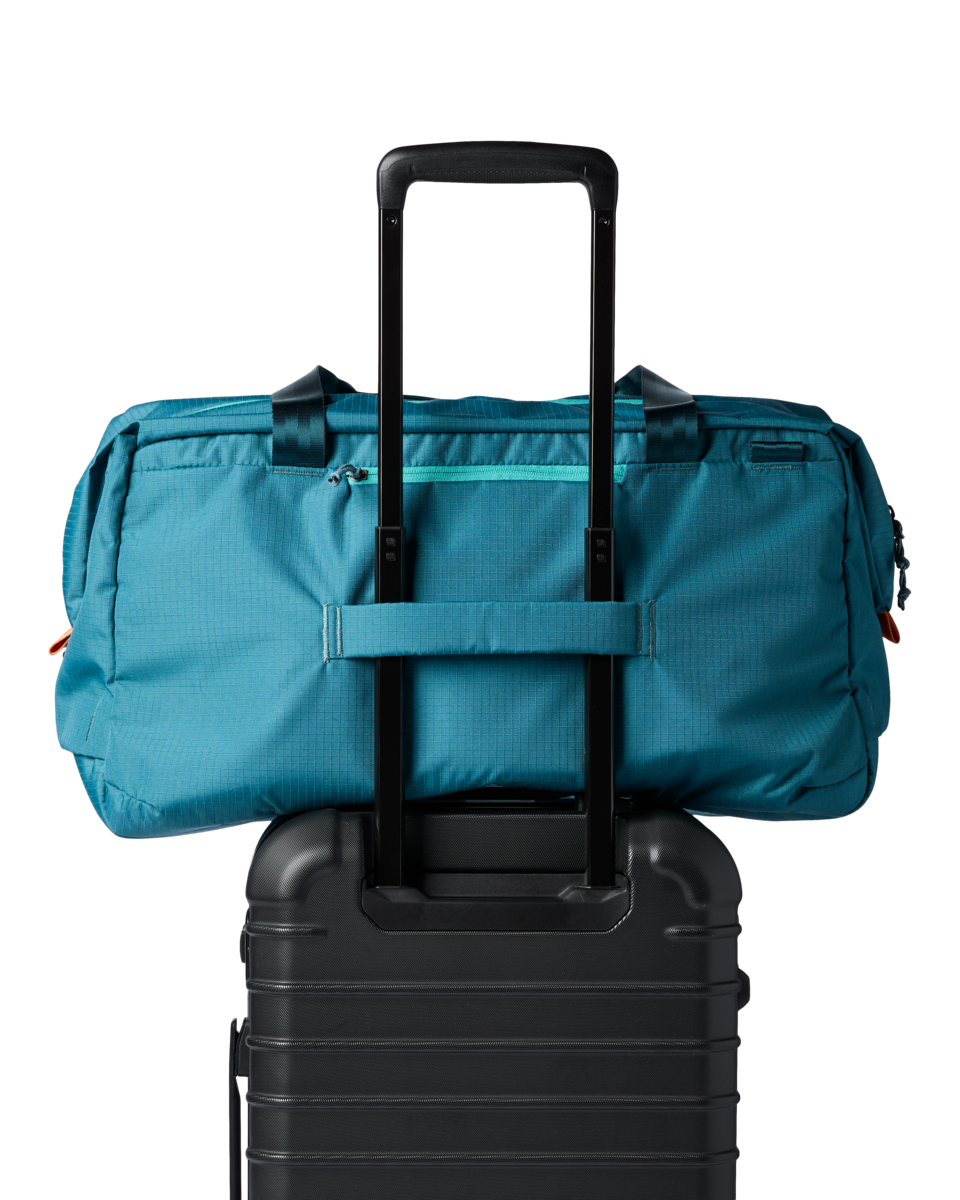 Cotopaxi Viaje 45L Travel Duffel in Blue Spruce — interior view