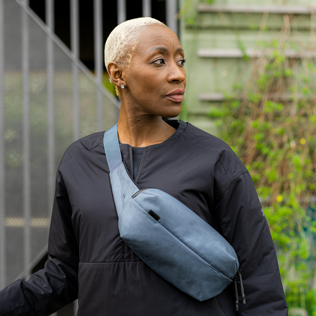 Thule Aion Sling Bag in Dark Slate — lifestyle 2