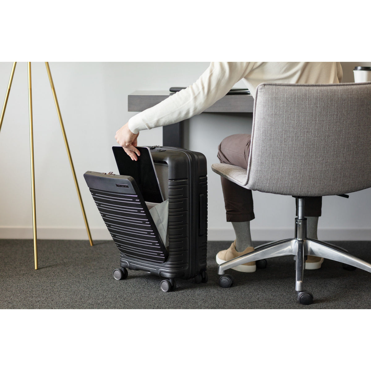 Samsonite Elevation Plus Carry-On Spinner in Triple Black — lifestyle