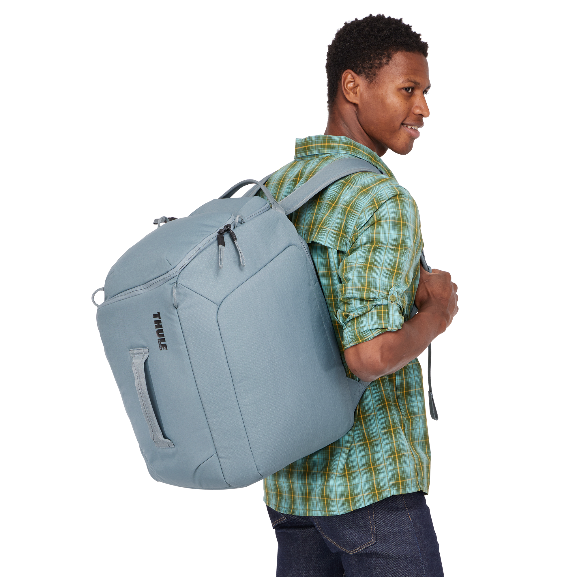 Thule RoundTrip Boot Backpack 45L in Mid Blue — lifestyle # color_Mid Blue