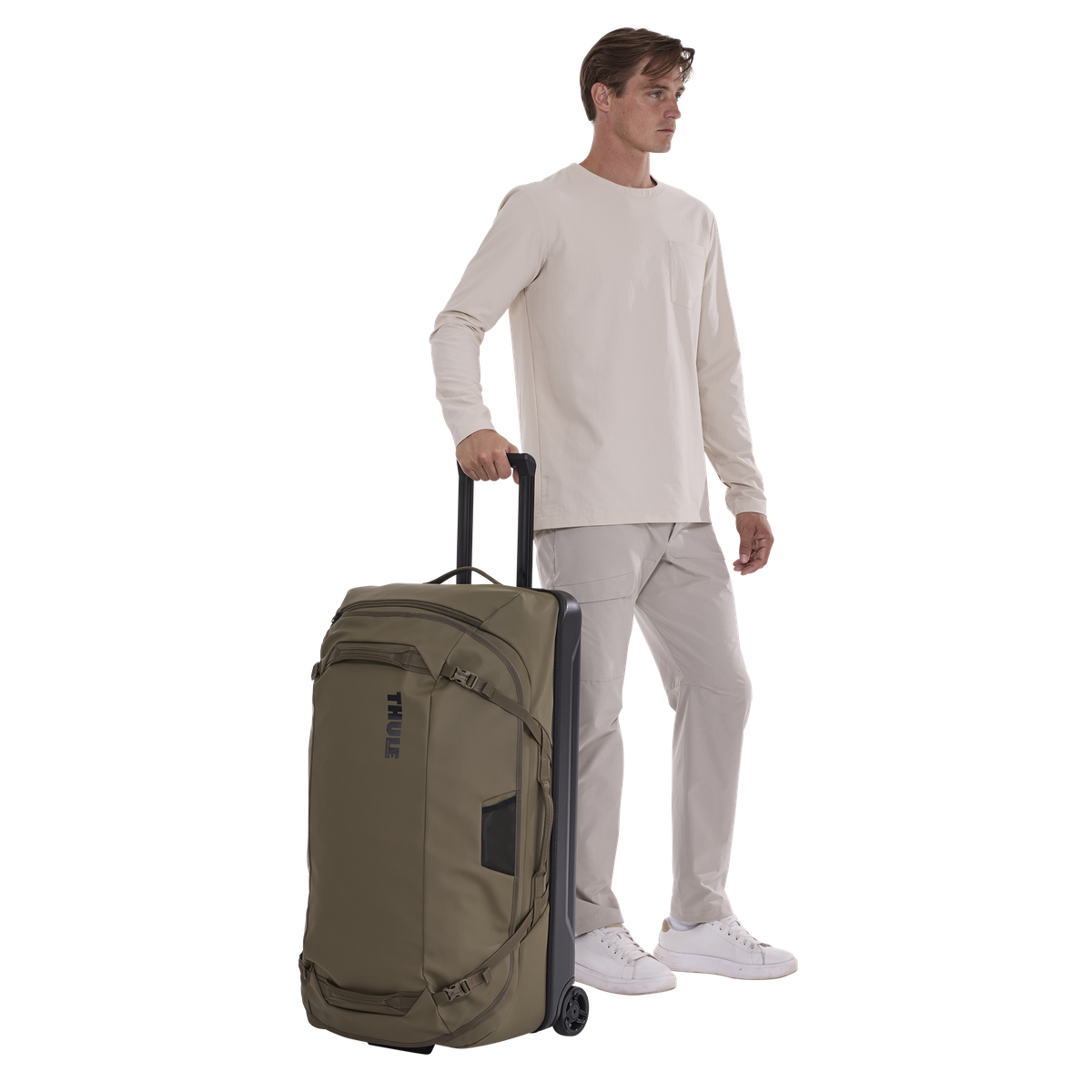Thule Chasm Wheeled Duffel Bag 81CM/32"-110L in Deep Khaki — lifestyle