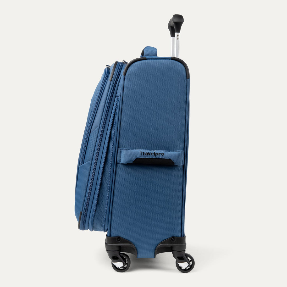 Travelpro Maxlite 5 21" Expandable Carry-On Spinner in Ensign Blue — angle view 2