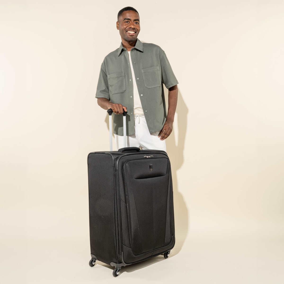 Travelpro Maxlite 5 29" Expandable Spinner in Black — lifestyle