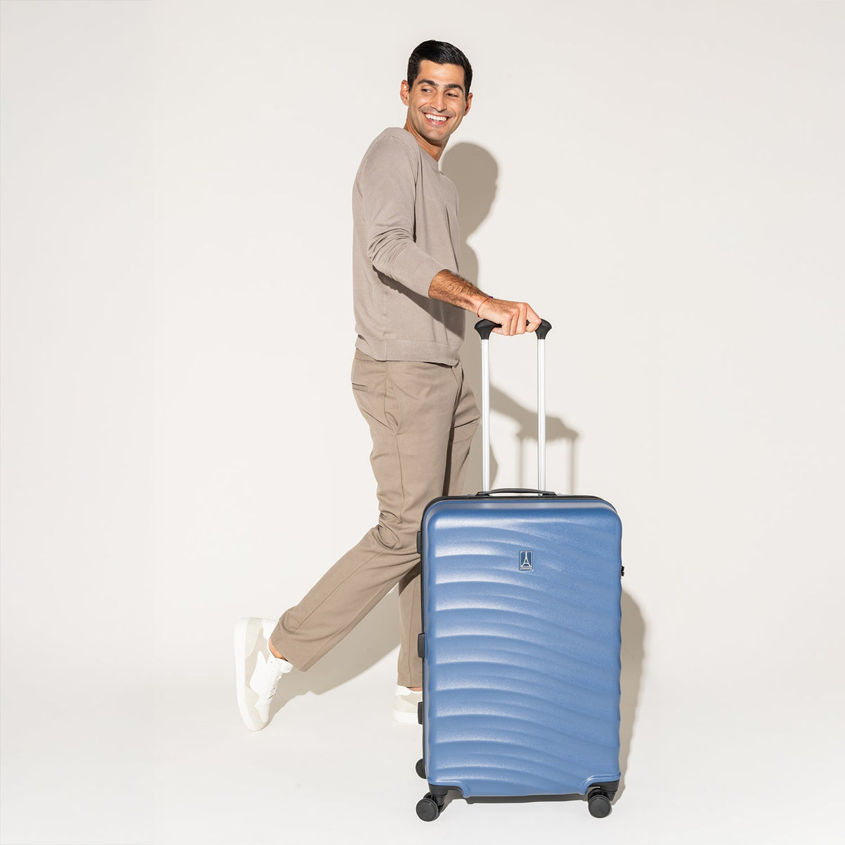 TravelPro Maxlite Air V2 Medium Check-In Hardside Spinner in Ensign Blue — lifestyle