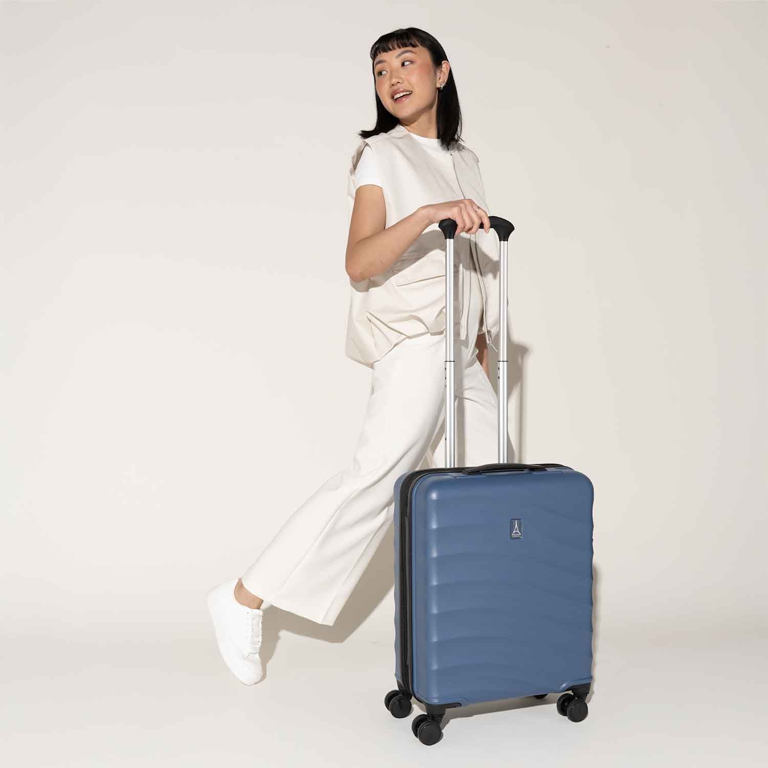 Travelpro Maxlite Air V2 International Carry-On Hardside Spinner in Ensign Blue — lifestyle