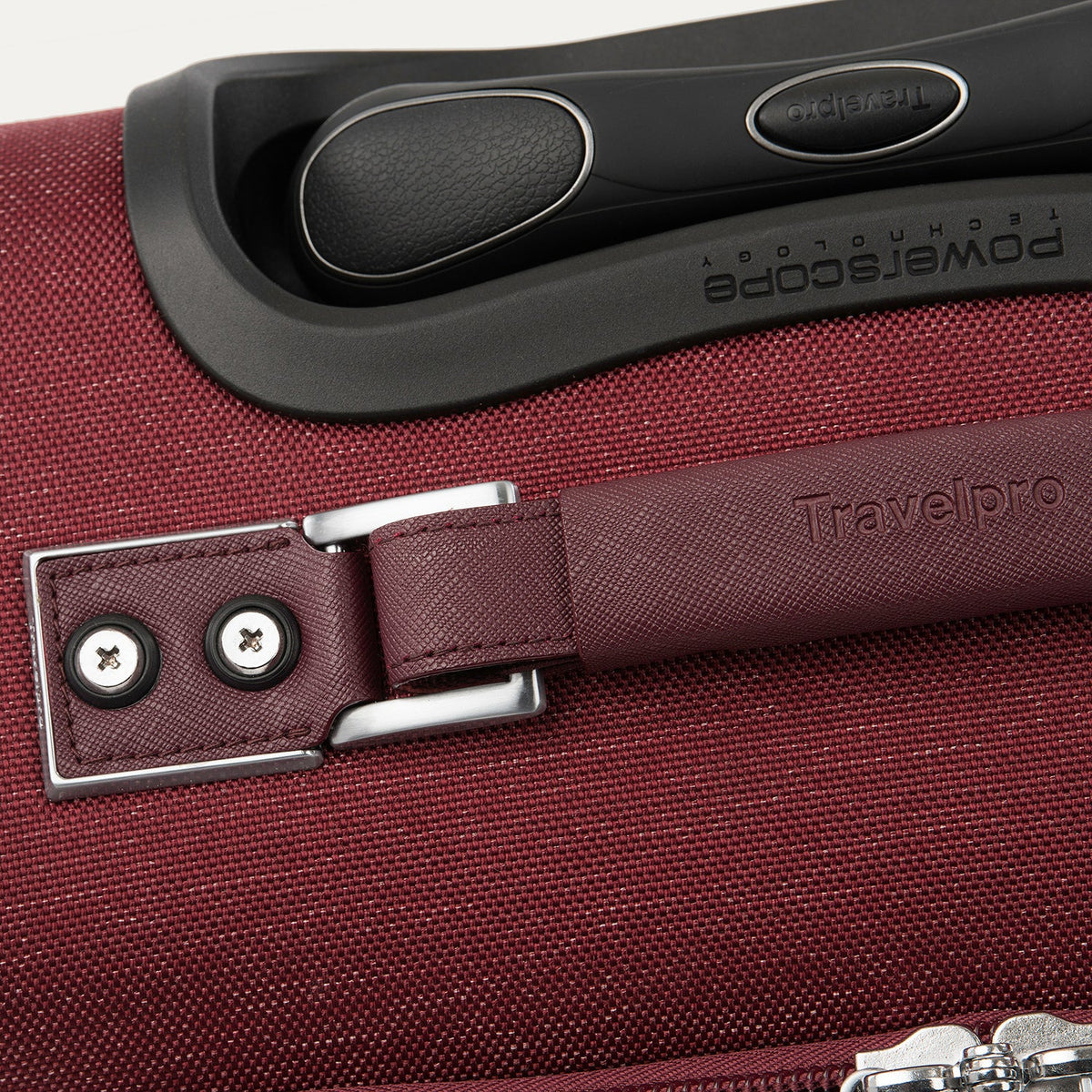 Travelpro Platinum Elite 21” Expandable Carry-On Spinner in Bordeaux — detail view 2