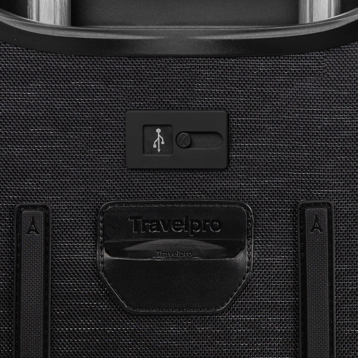 Travelpro Platinum Elite 21” Expandable Carry-On Spinner in Intrigue Black — detail view