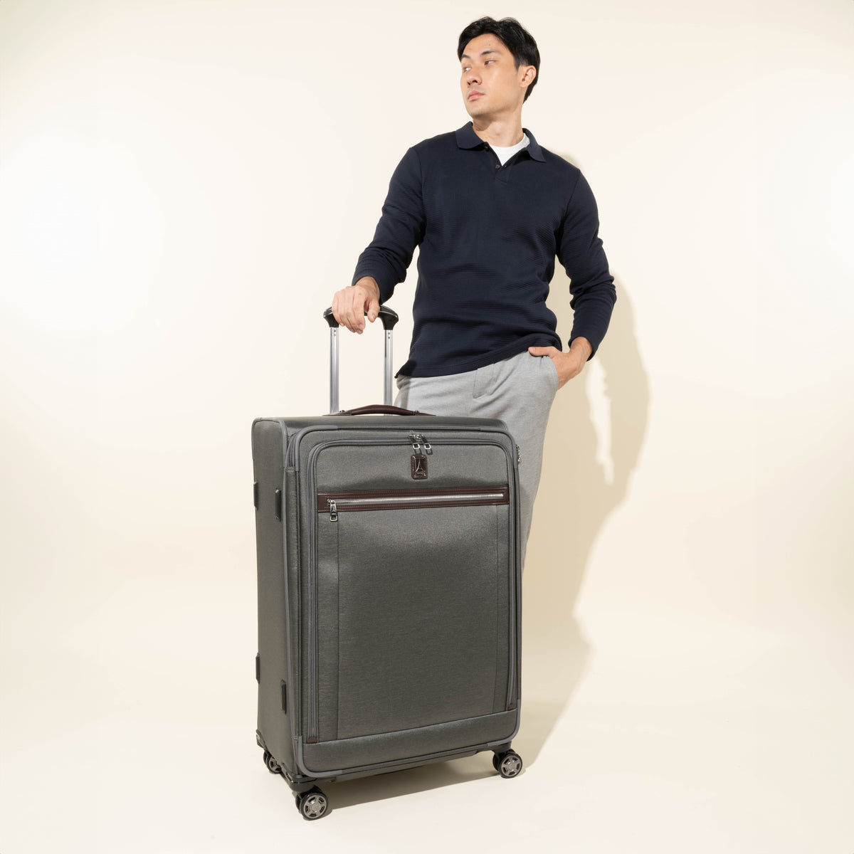 Travelpro Platinum Elite 29” Expandable Spinner in Vintage Grey — lifestyle