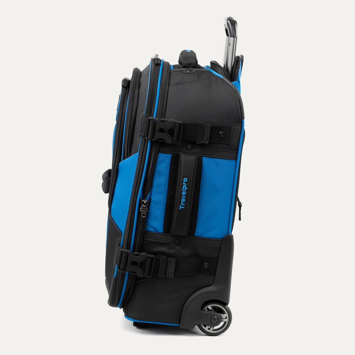 Travelpro Bold By Travelpro 22" Carry-On Expandable Rollaboard in Blue — angle view 2