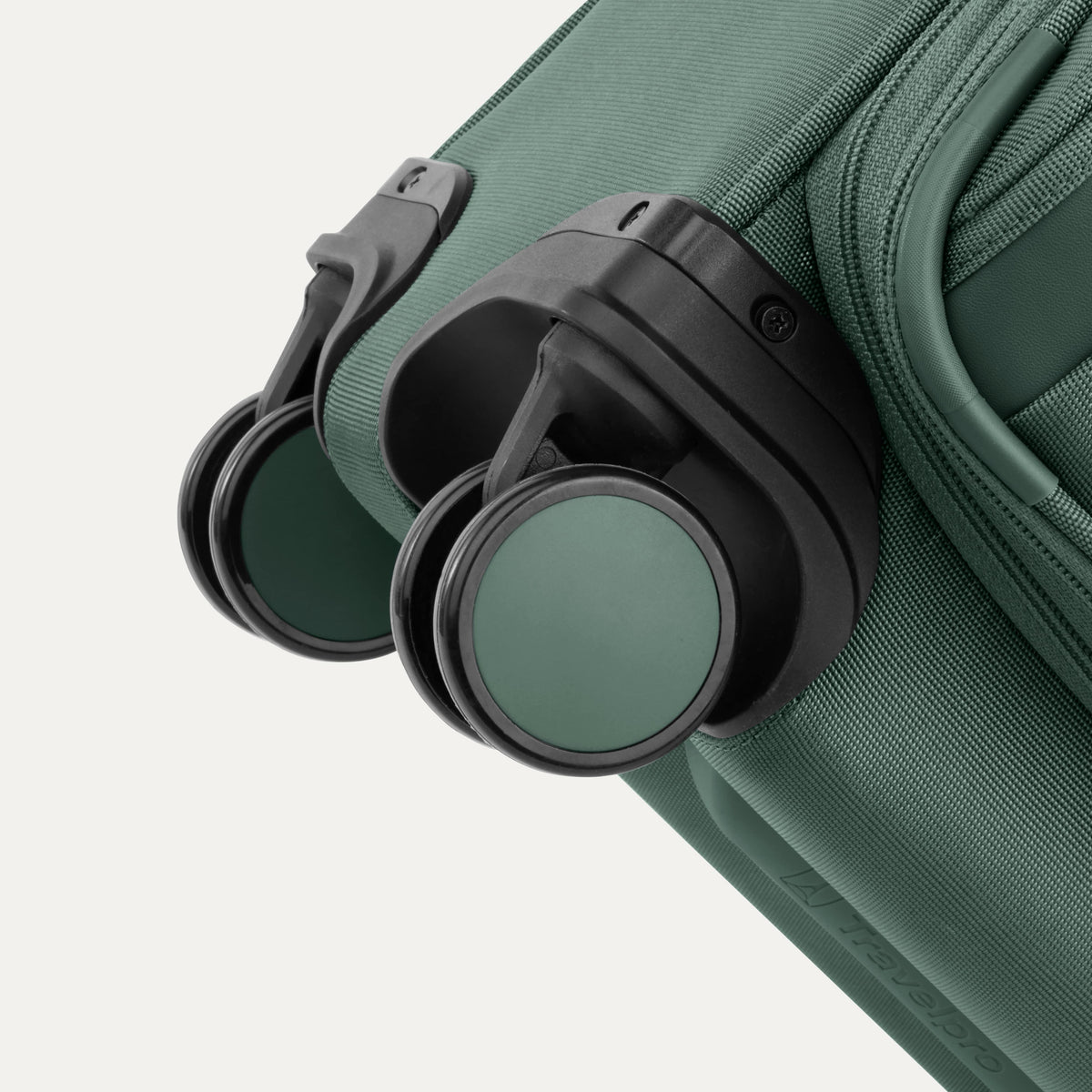 Travelpro VersaPack+ Carry-On Spinner in Desert Sage Green — detail view