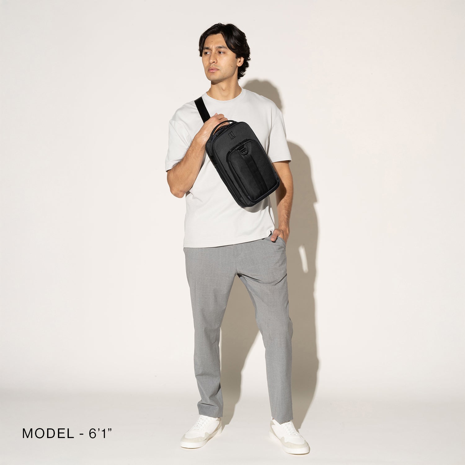 Travelpro Altitude Crossbody 6L in Jet Black — angle view 2