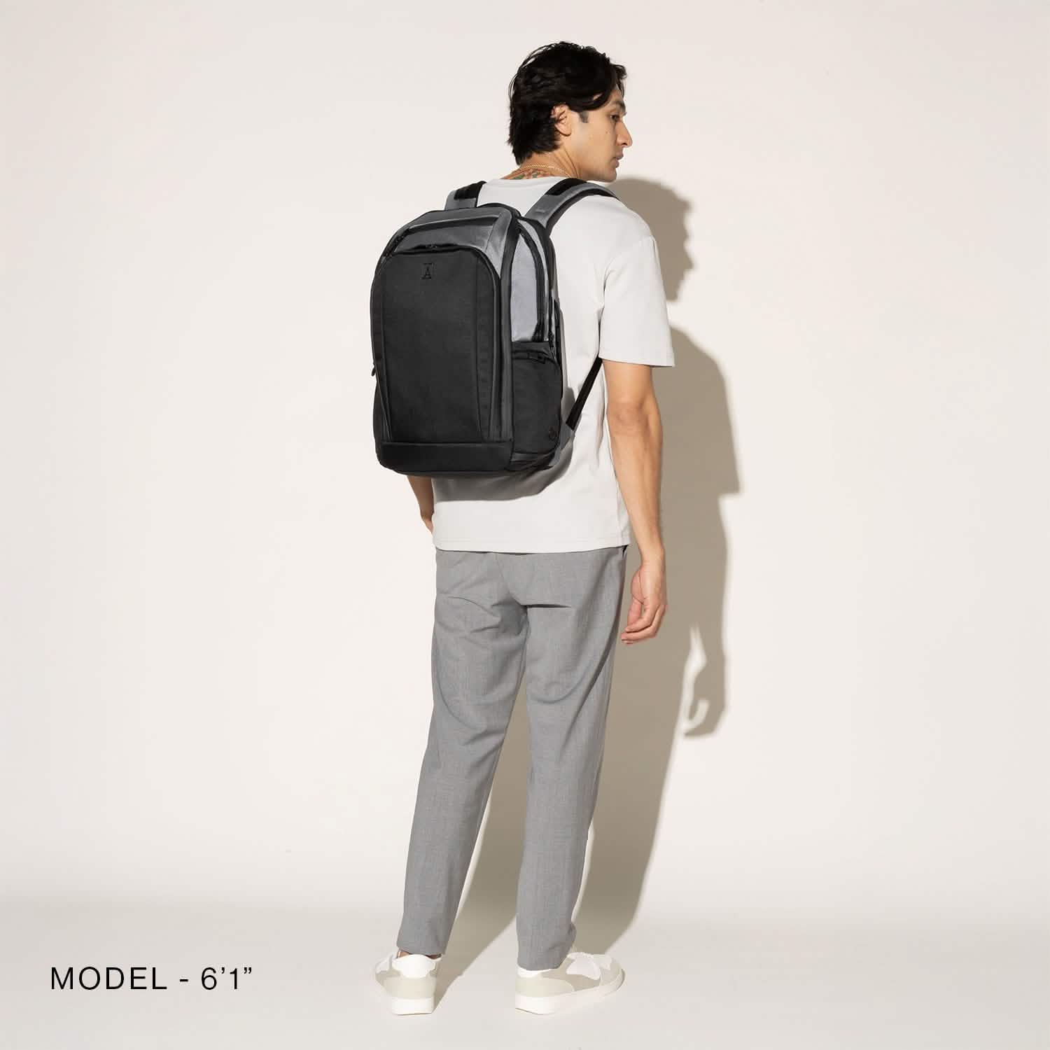 Travelpro Altitude All-Purpose Full Expansion Laptop Backpack 24-34L in Falcon Grey — lifestyle view