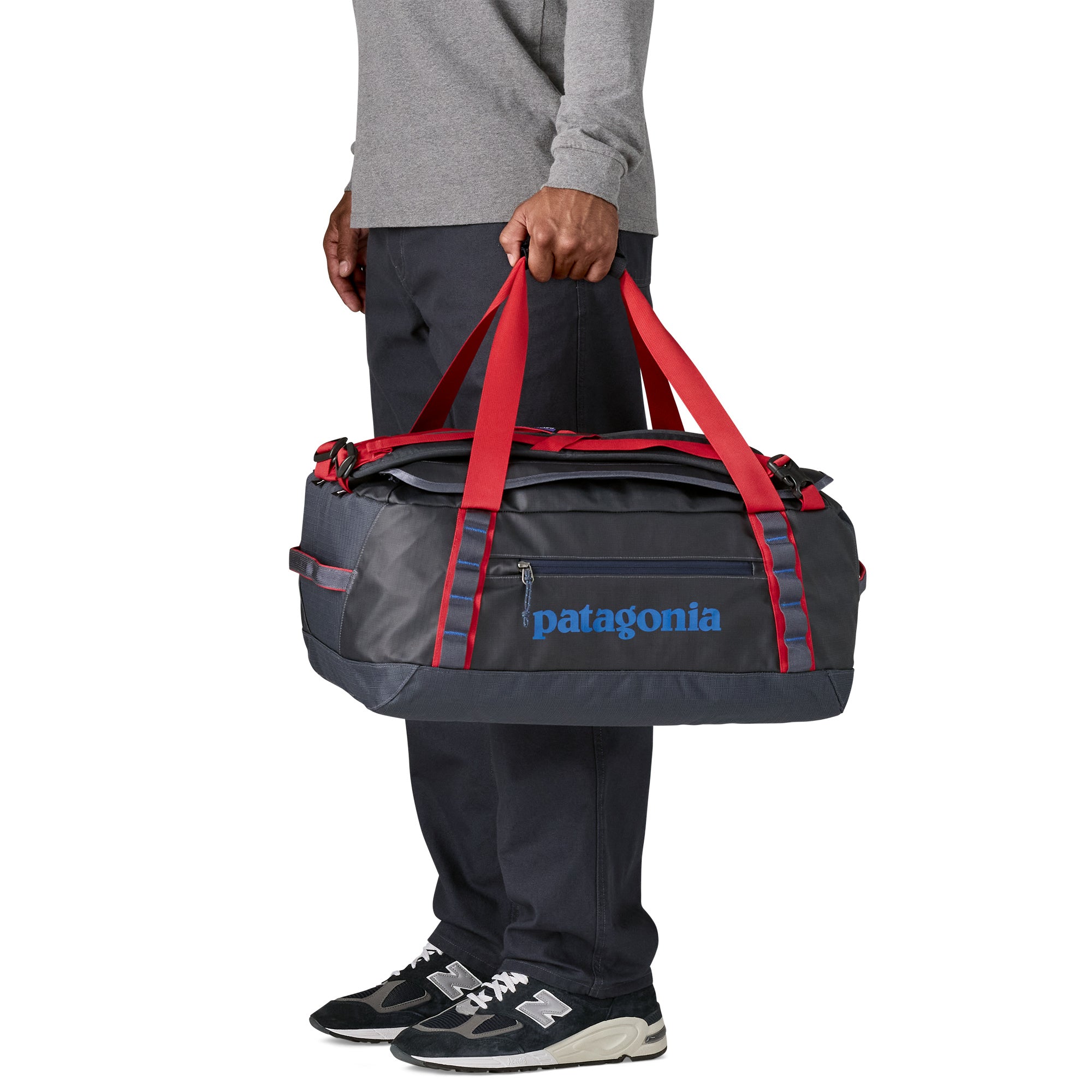 Patagonia Black Hole Duffel 40L in Smolder Blue/Amanita Red — angle view 1