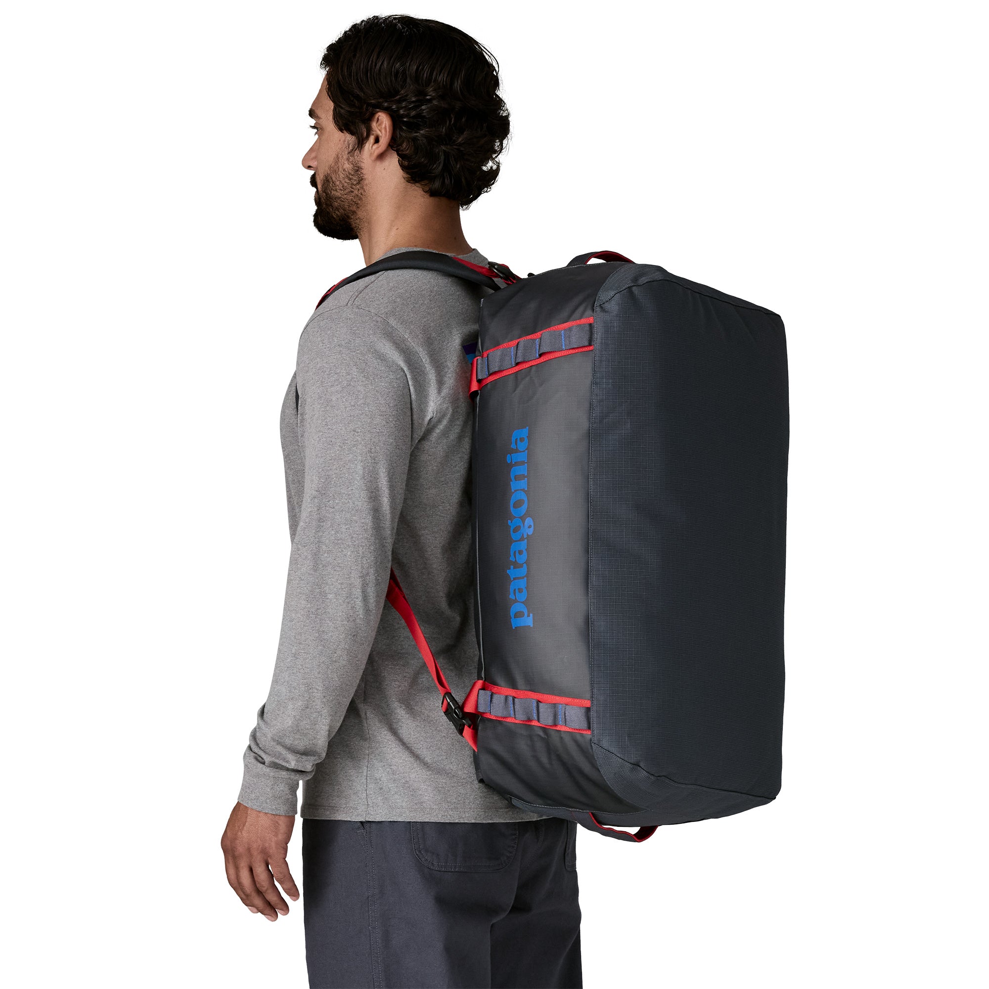 Patagonia Black Hole Duffel 55L in Smolder Blue/Amanita Red — back view