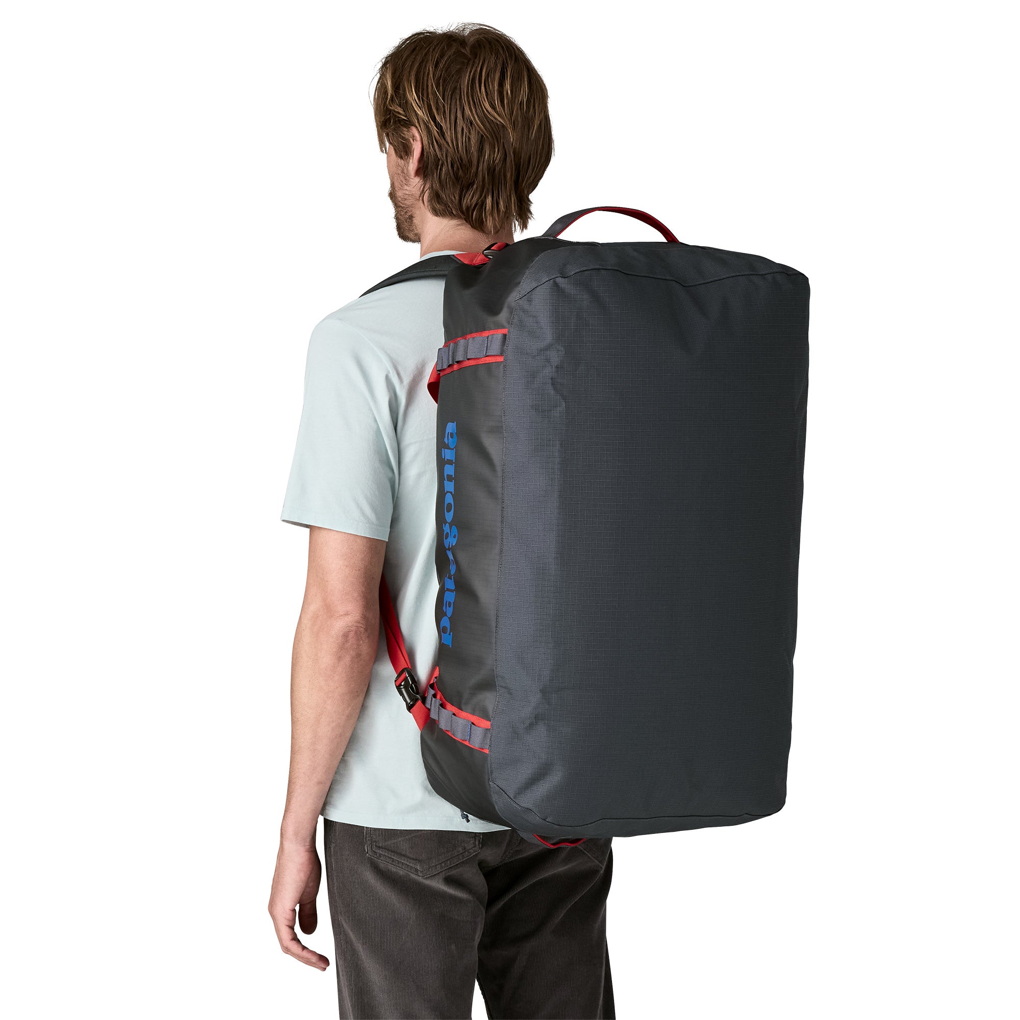Patagonia Black Hole Duffel 70L in Smolder Blue/Amanita Red — back view