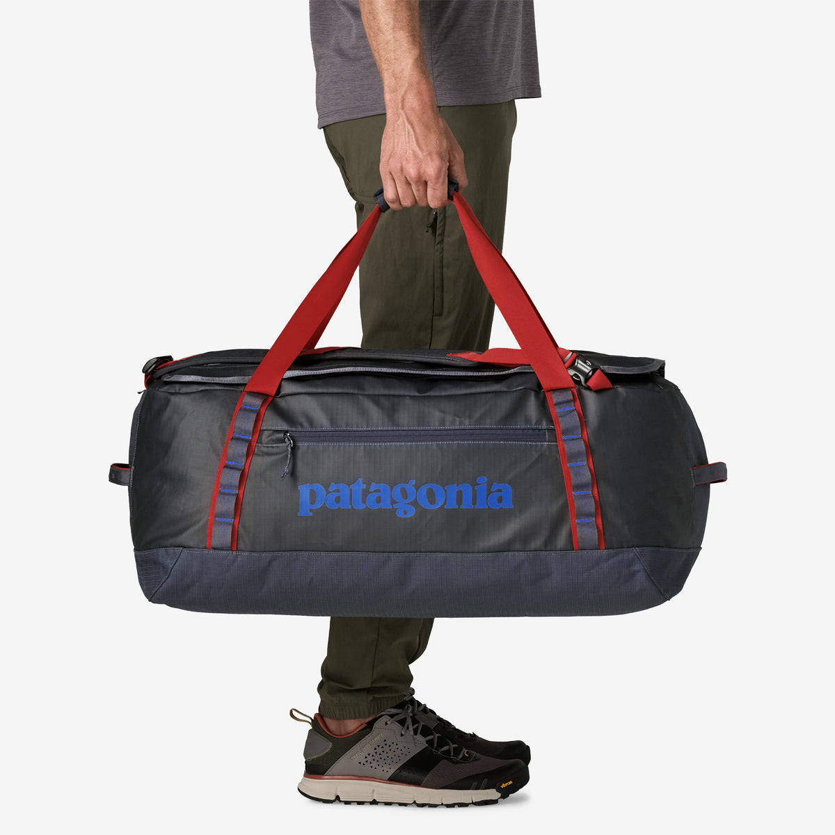 Patagonia Black Hole Duffel 70L in Smolder Blue/Amanita Red — lifestyle 3
