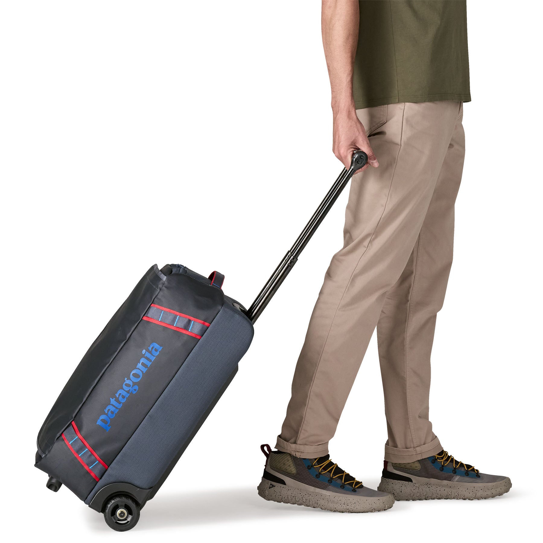 Patagonia Black Hole Wheeled Duffel 40L in Smolder Blue/Amanita Red — lifestyle