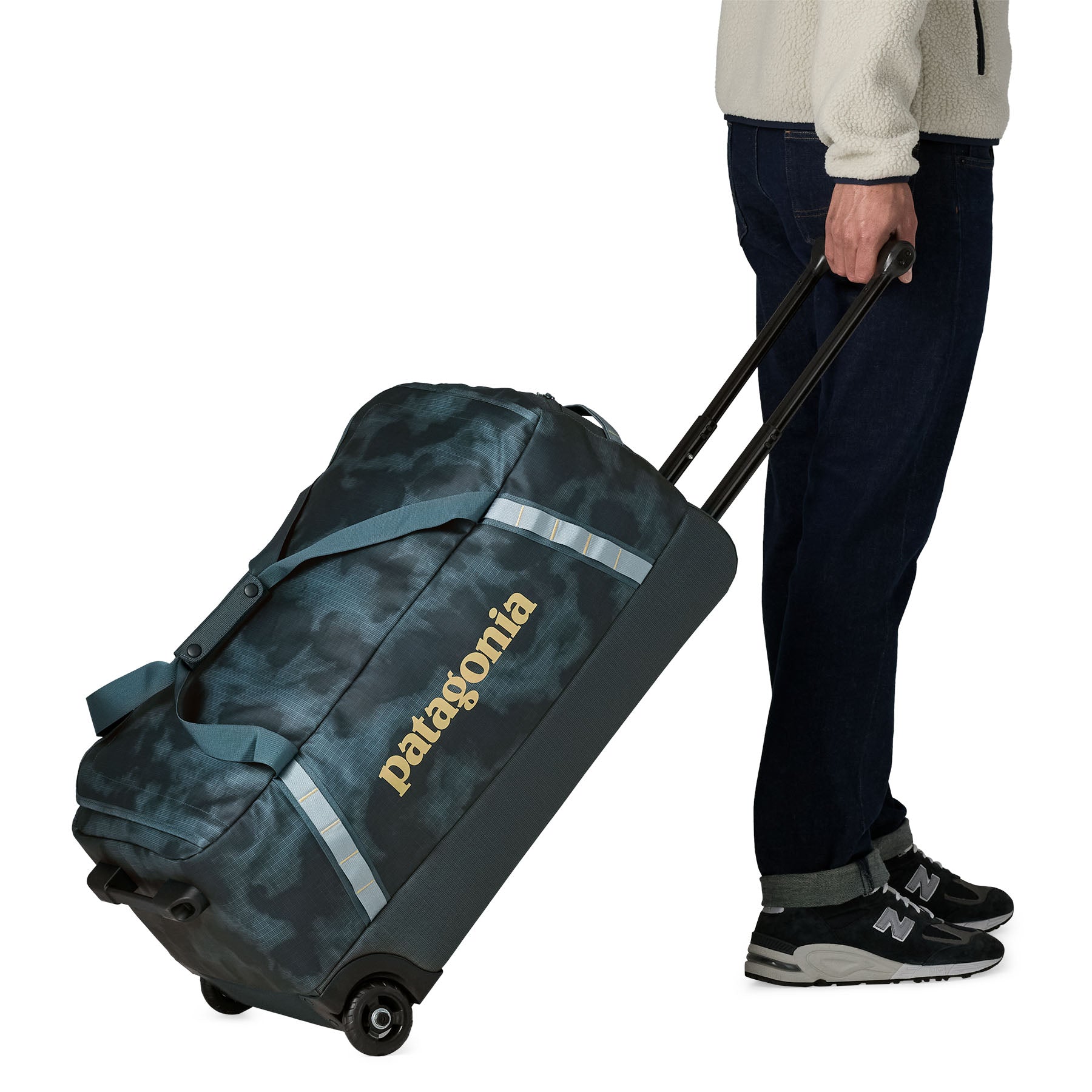 Patagonia Black Hole Wheeled Duffel 70L in Sastrugi: Summit Blue — lifestyle