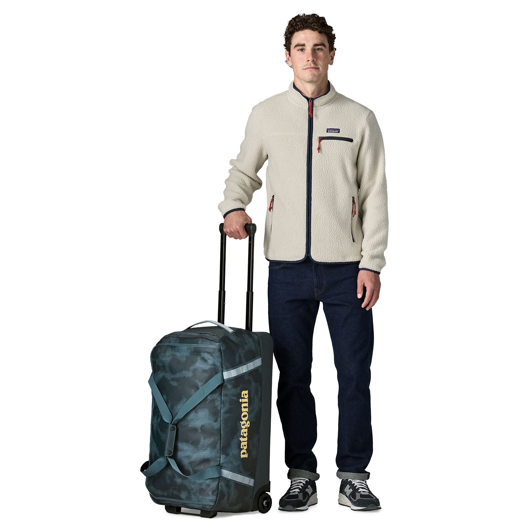 Patagonia Black Hole Wheeled Duffel 70L in Sastrugi: Summit Blue — lifestyle 3