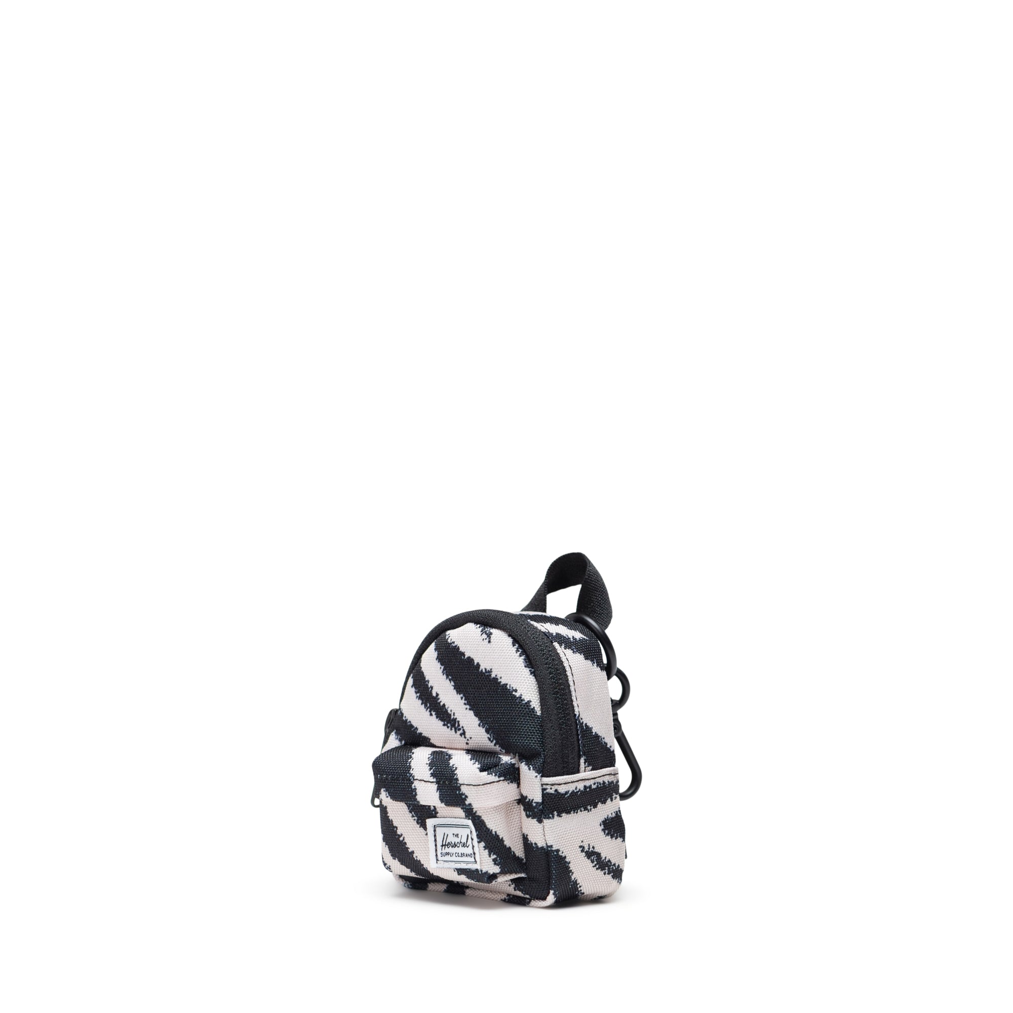 Herschel Classic Backpack Bag Charm in Zebra — three-quarter view
