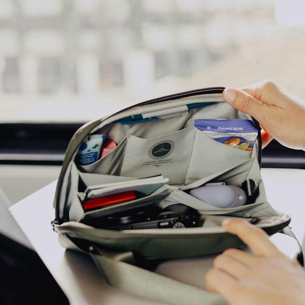 Peak Design Travel Crossbody 3L in Sage — lifestyle