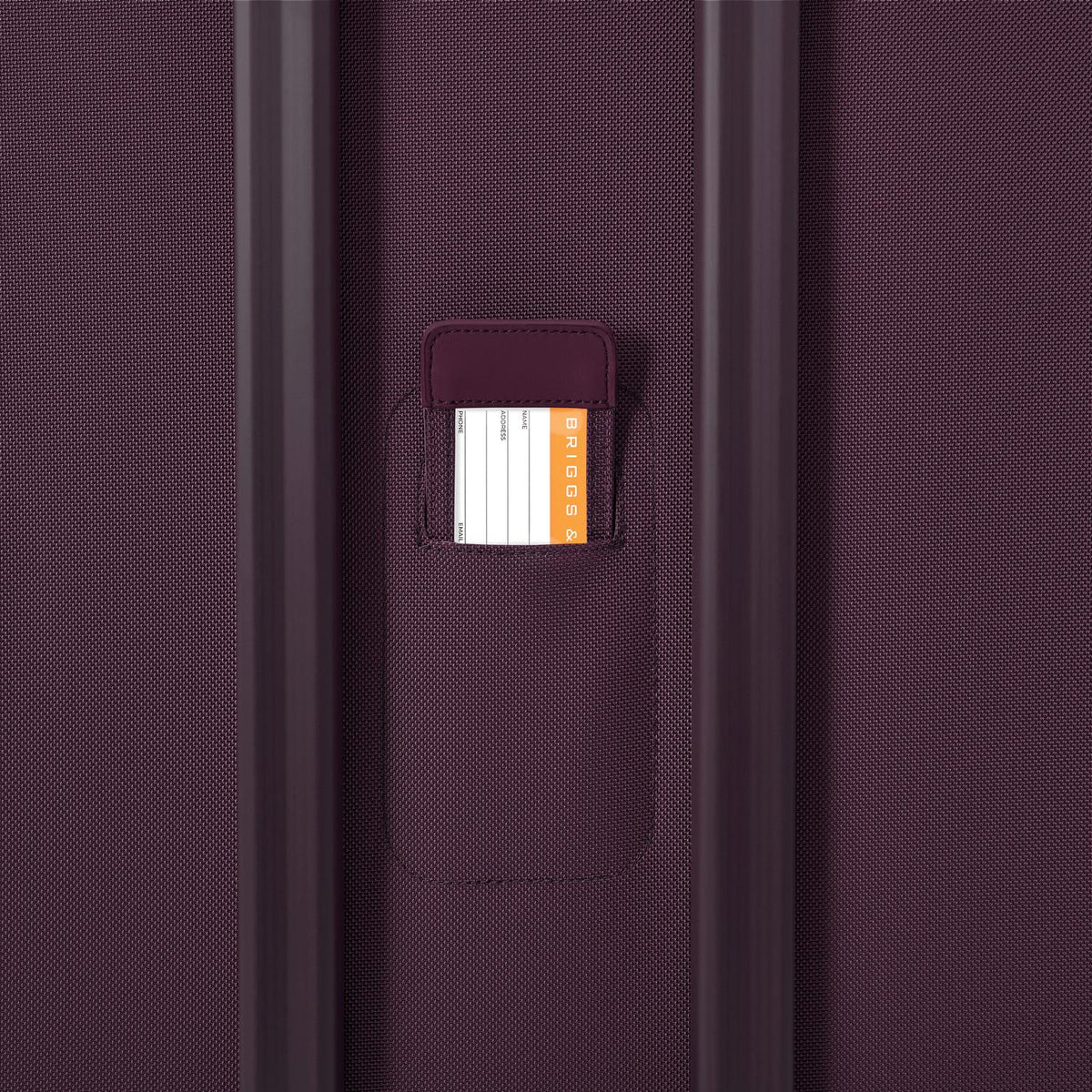 Briggs & Riley Baseline Medium Expandable Spinner in Plum — detail view 5