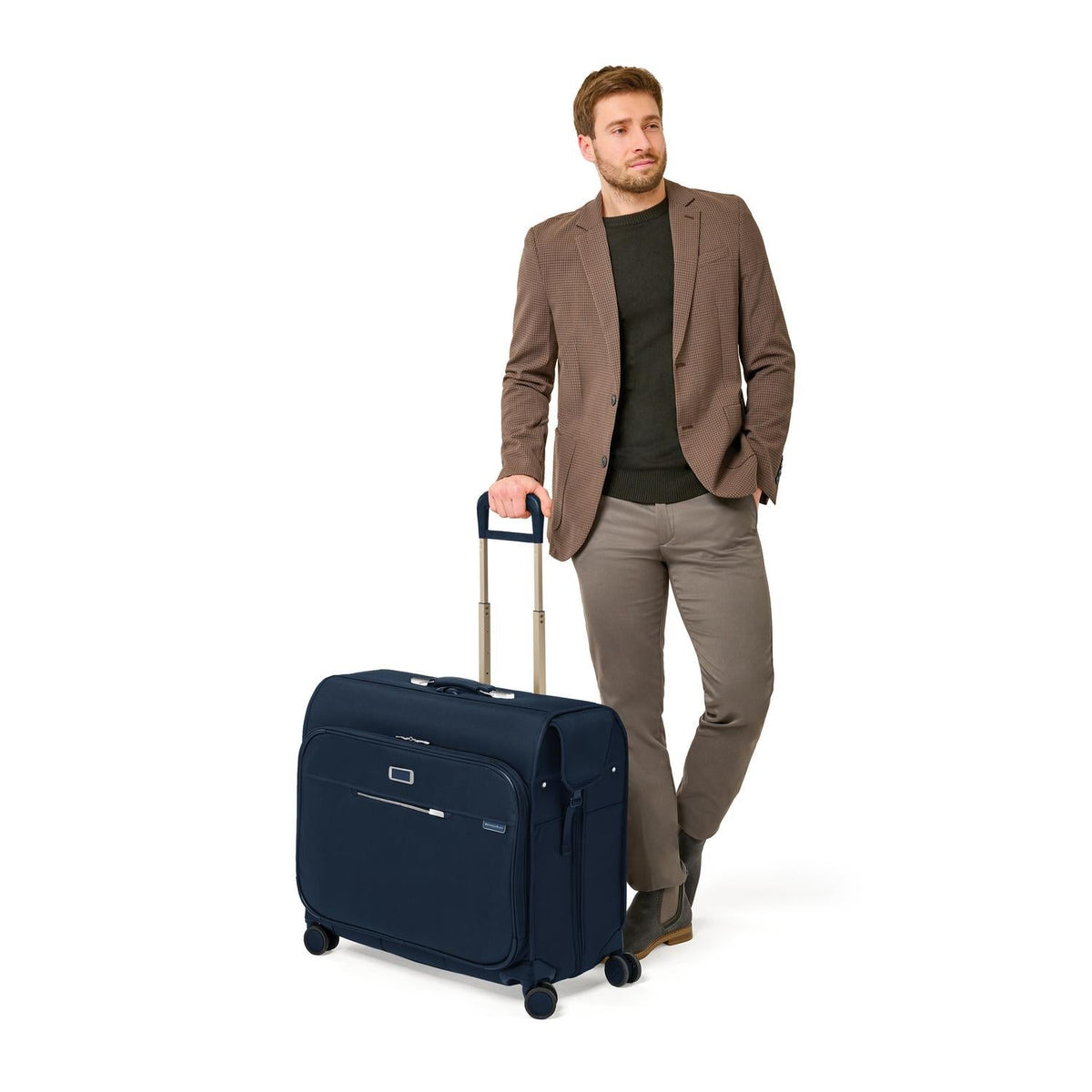 Briggs & Riley Baseline Deluxe Wardrobe Spinner in Navy — lifestyle