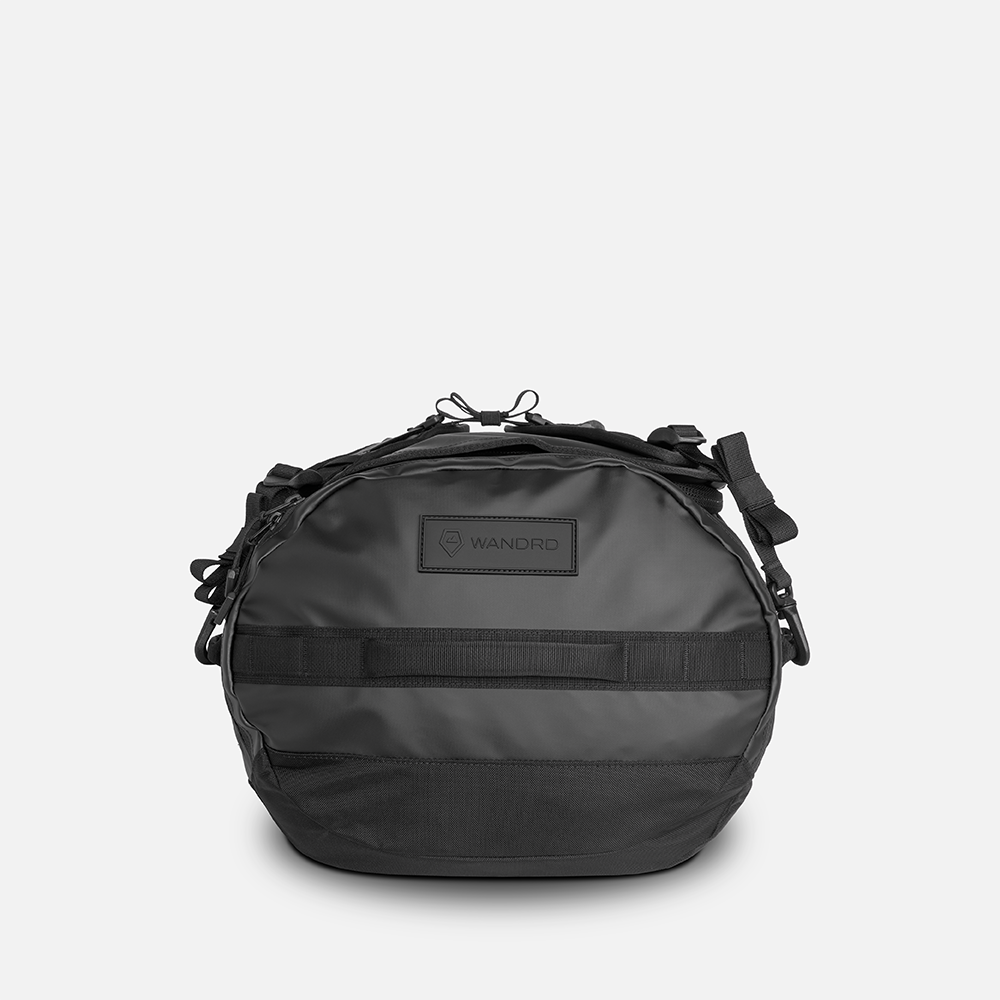 WANDRD CARRYALL Duffel 60L in Black — angle view 2