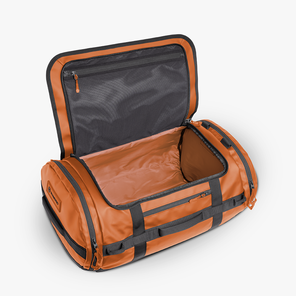 WANDRD CARRYALL Duffel 60L in Sedona Orange — interior view