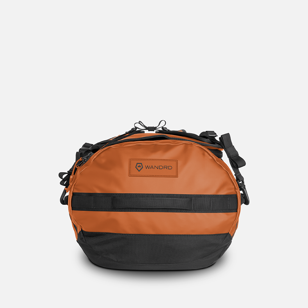 WANDRD CARRYALL Duffel 60L in Sedona Orange — angle view 2