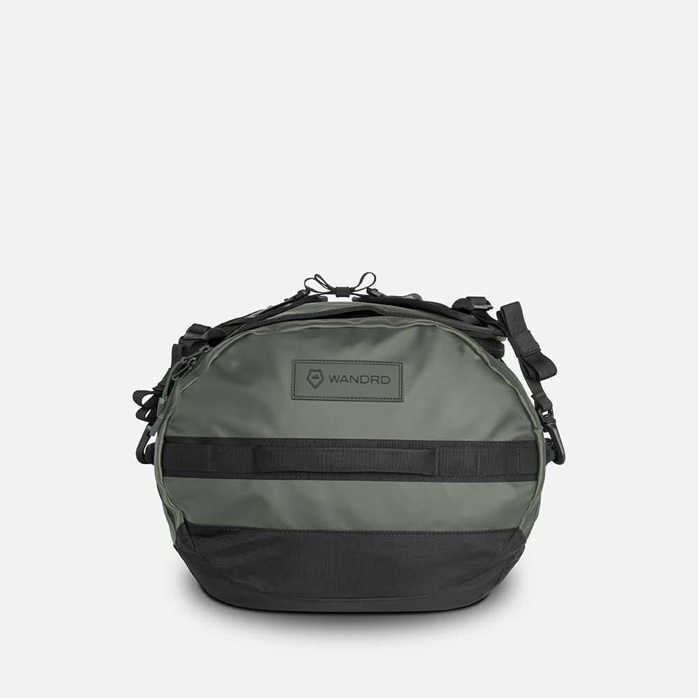WANDRD CARRYALL Duffel 60L in Wasatch Green — angle view 2