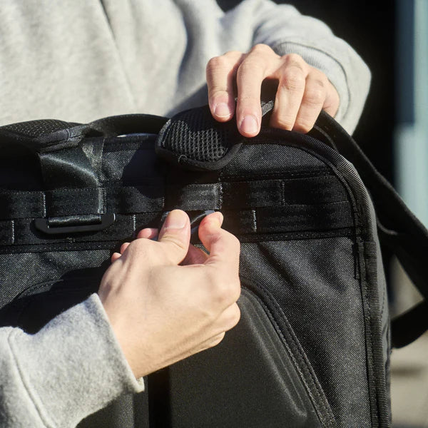 Chrome Industries Cohesive 2.0 38L travel pack – close-up of the strap buckle