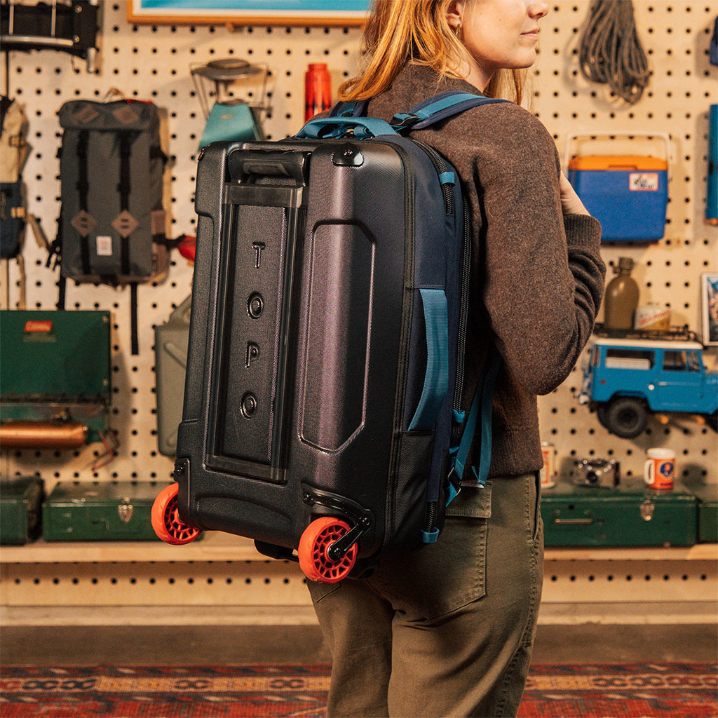 Topo Designs Global Travel Bag Roller-Carry On in Black Black — lifestyle 2
