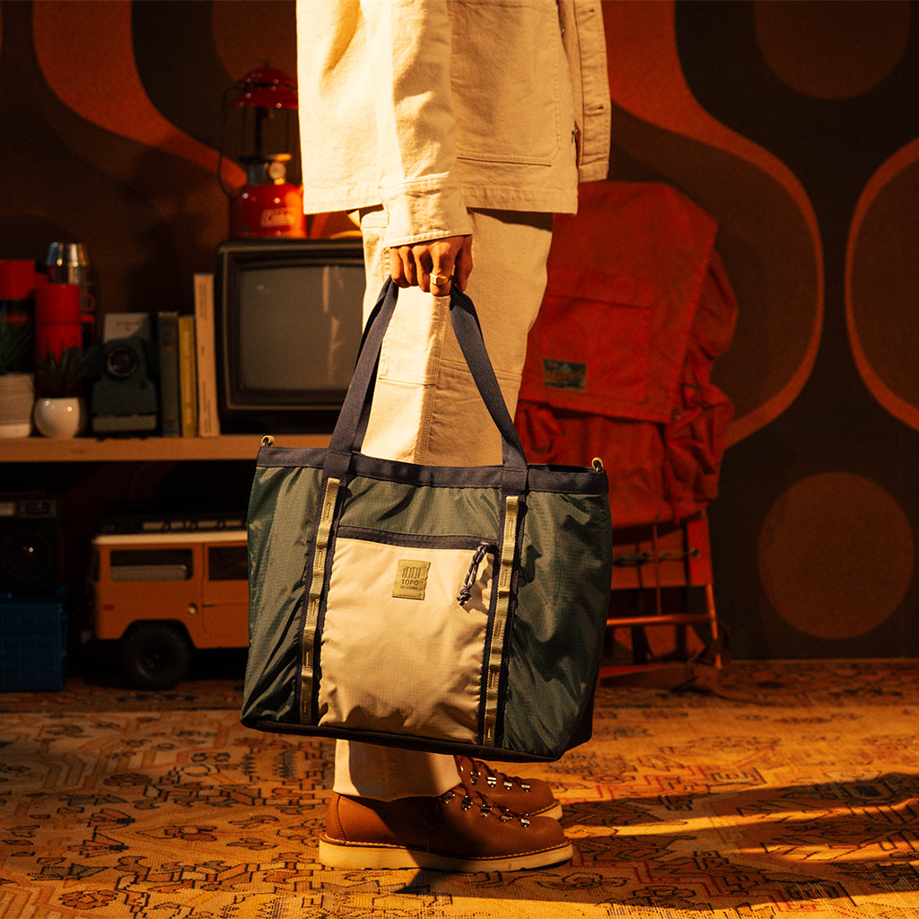 Topo Designs Mountain Utility Tote in Forest Bone White — lifestyle # color_Forest Bone White