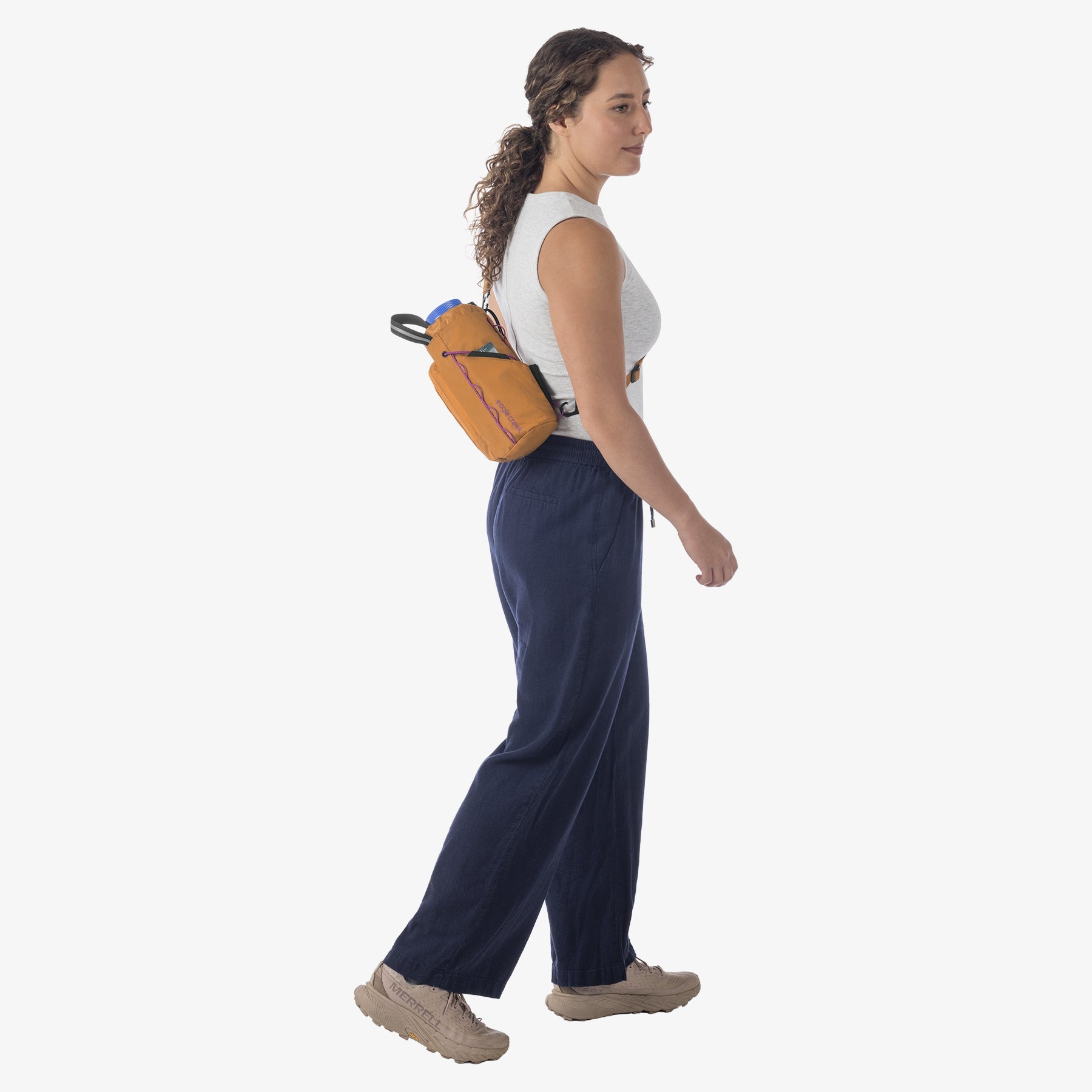 Eagle Creek Ranger Water Bottle Sling in Iron Orange — lifestyle 2