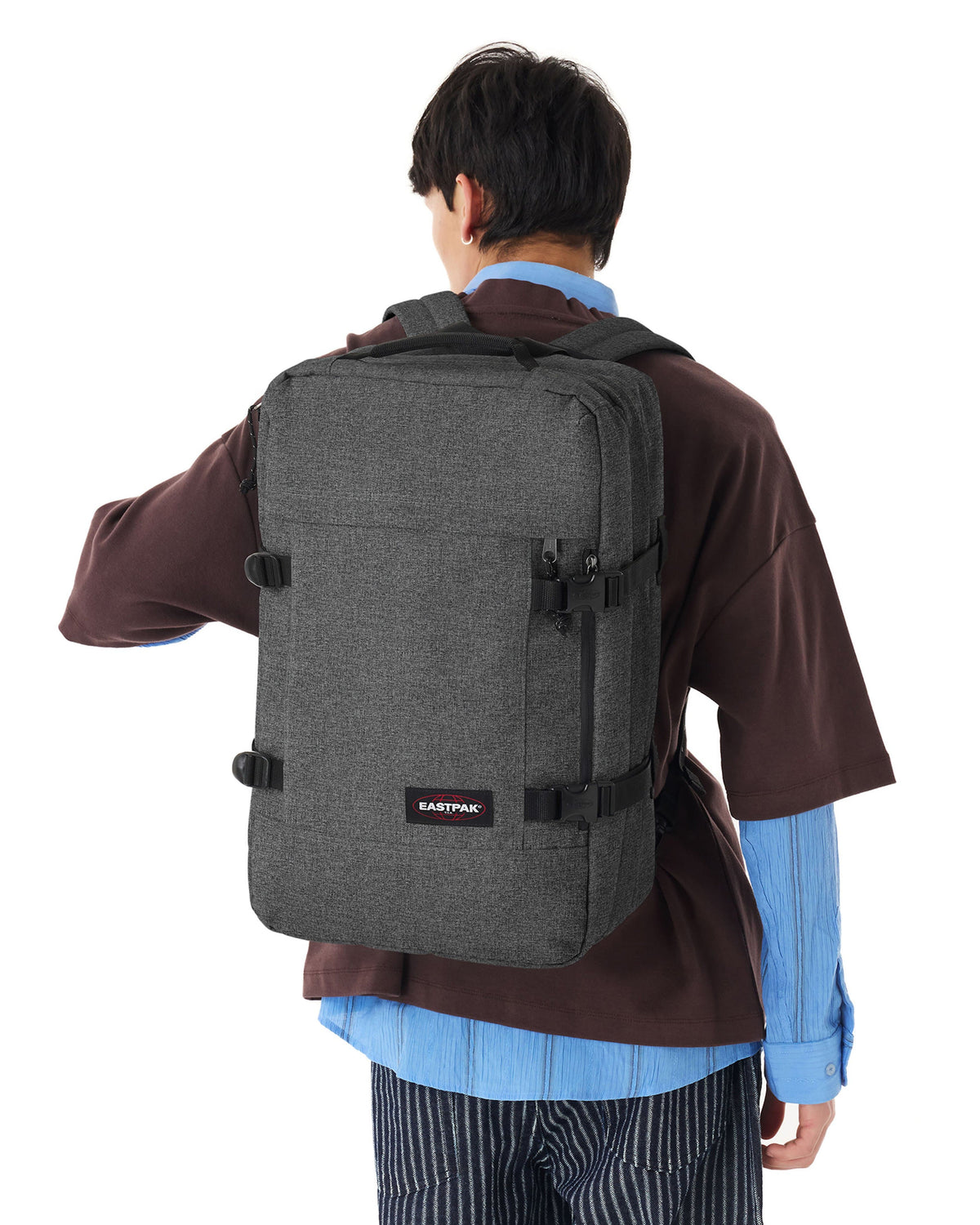 Eastpak Travelpack Backpack 42L in Black Denim — lifestyle