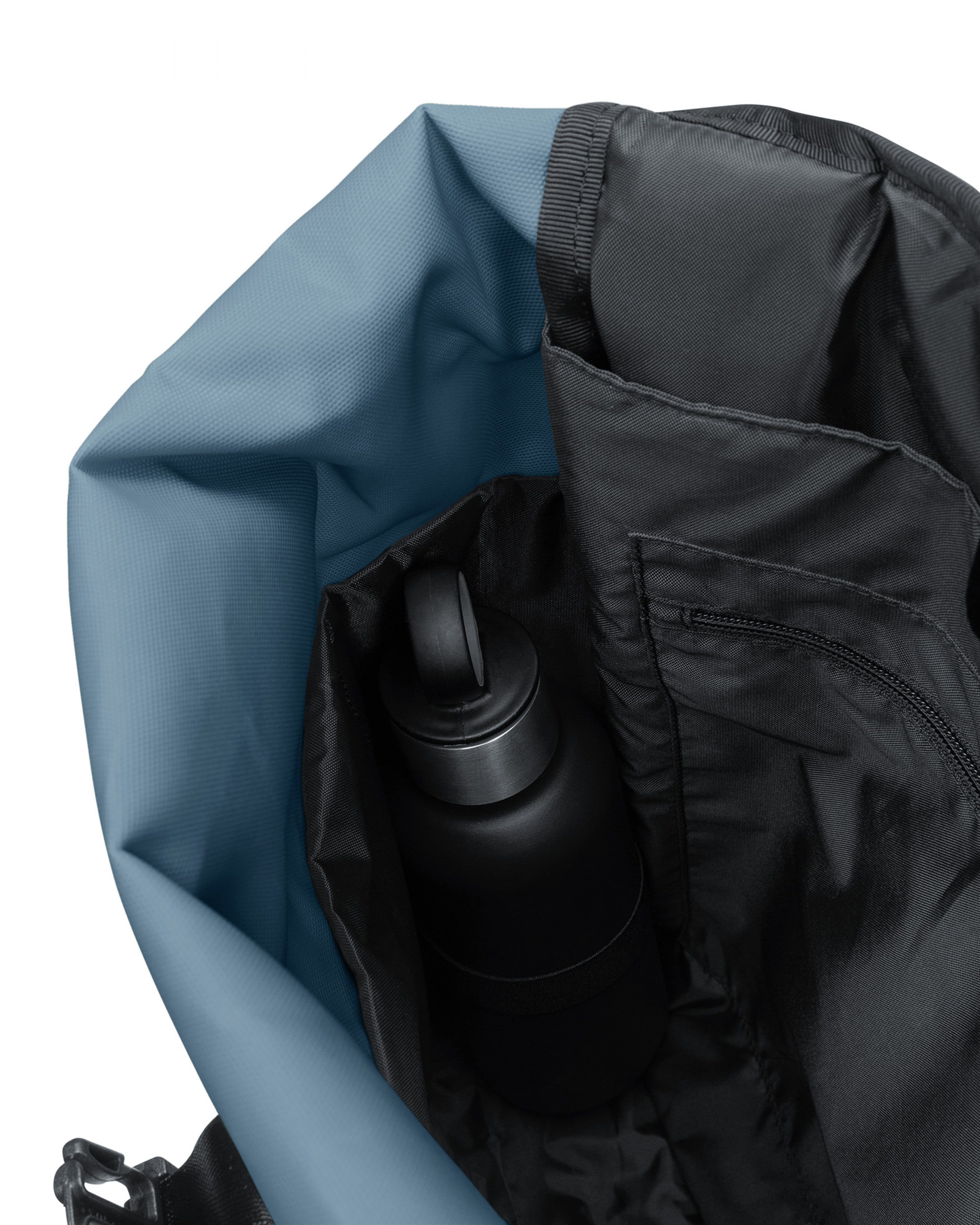 Eastpak Up Roll Rolltop Backpack 23L in Tarp Dust Blue — interior view 2 # color_Tarp Dust Blue