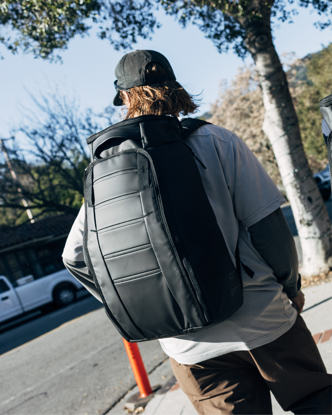 Db Journey Hugger Backpack 30L in Black Out — lifestyle # color_Black Out