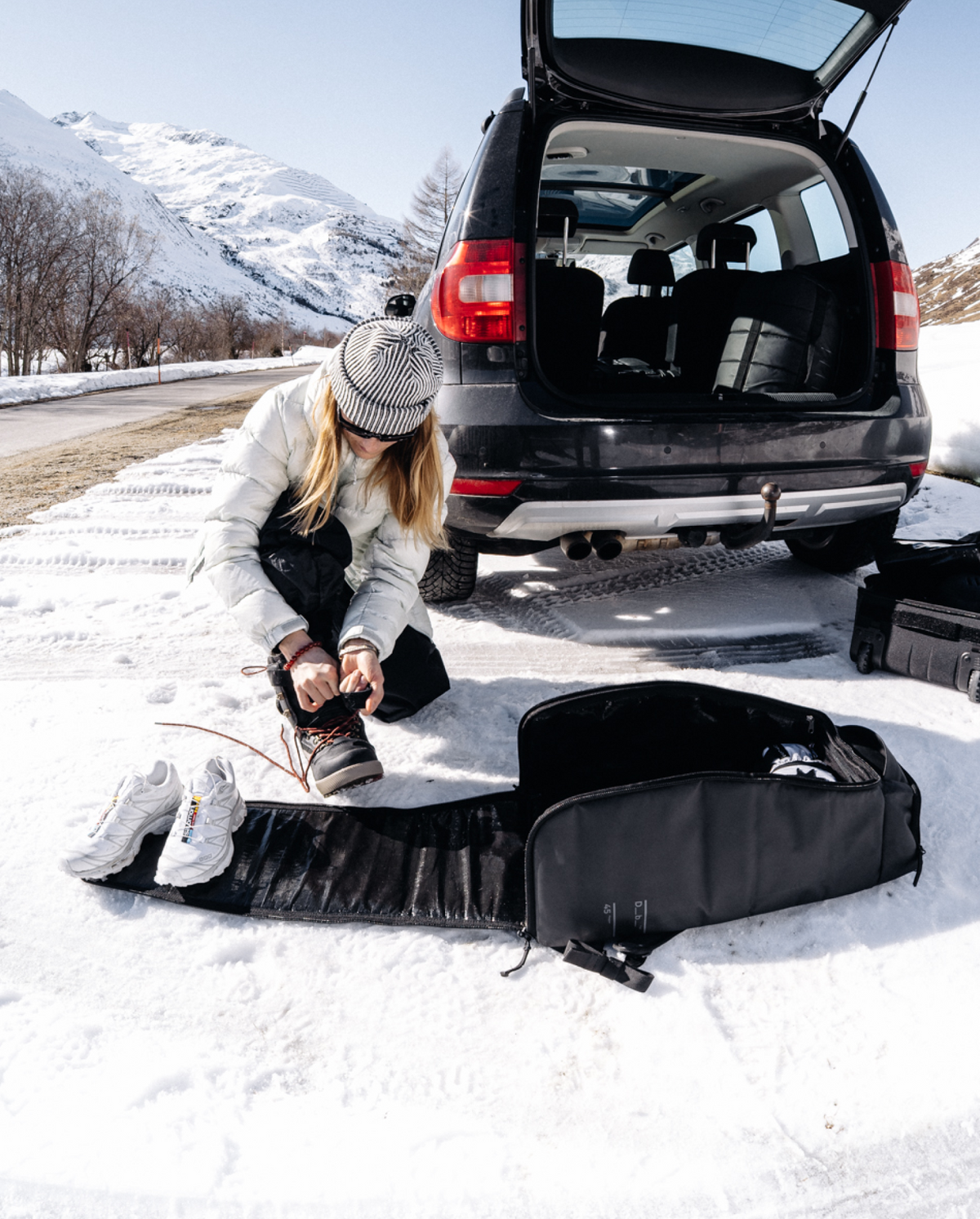 Db Journey Hugger Bootpack 45L in Black Out — lifestyle