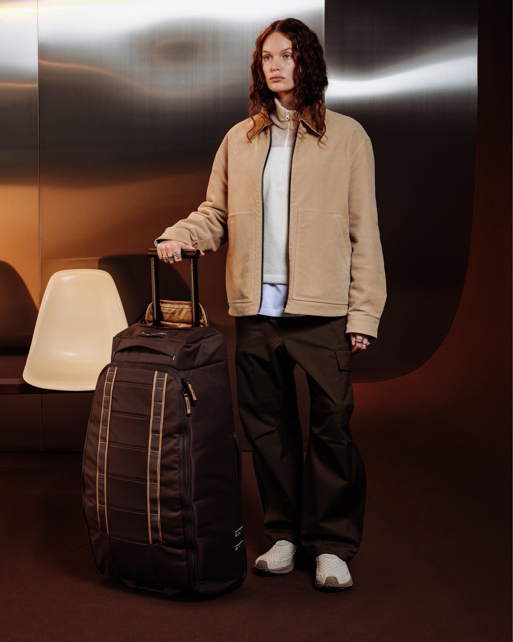Db Journey Hugger Roller Bag Check-in 60L in Espresso — lifestyle # color_Espresso